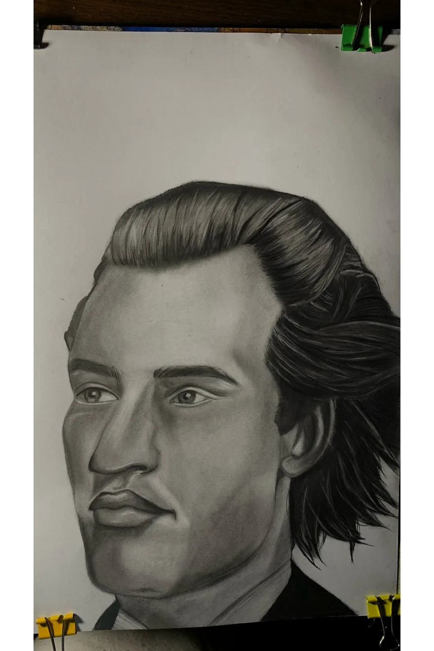 Graphite portrait study on paper by Vanessa.
