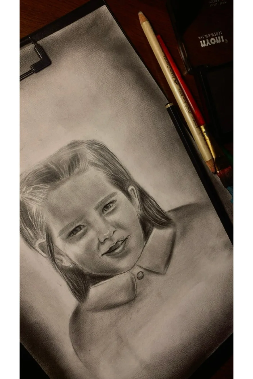 Character focused graphite drawing by Vanessa.